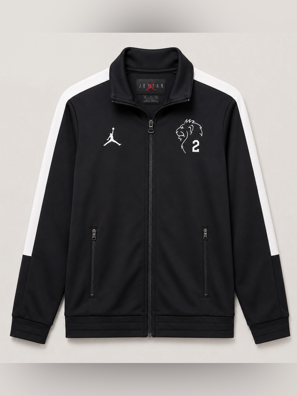 Jordan Unisex Black Athletic Jacket with White Shoulder Stripes